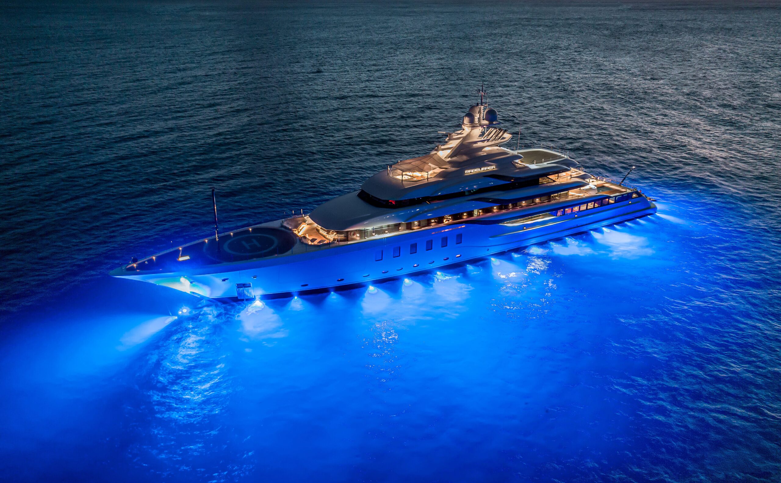 Aerial night view of Madsummer superyacht by Lürssen, captured by luxury yacht photographer Juan David Téllez
